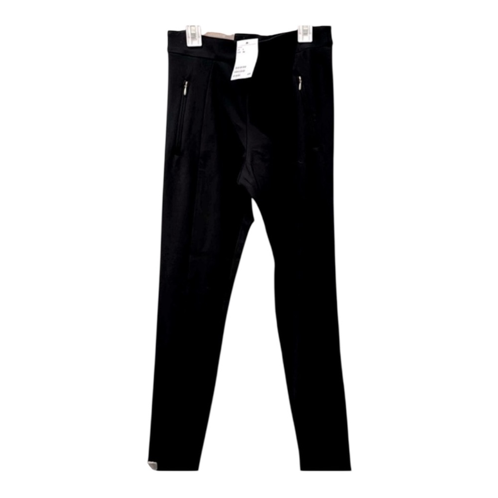 H&M slim skinny black pants. Gold accented pockets. Women’s Size 4